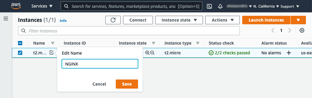 Screenshot of Amazon EC2 'Instances' page showing editing of instance name