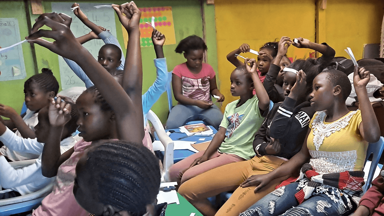 Students raising their hands