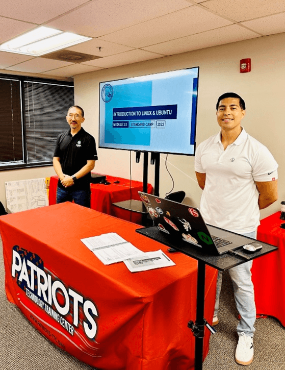 F5 Solution Engineers Sam Park and Ivan Reyes Mendez at the AFA CyberCamp